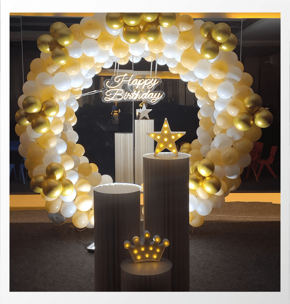 Kids birthday decoration with balloons and cake setup 2