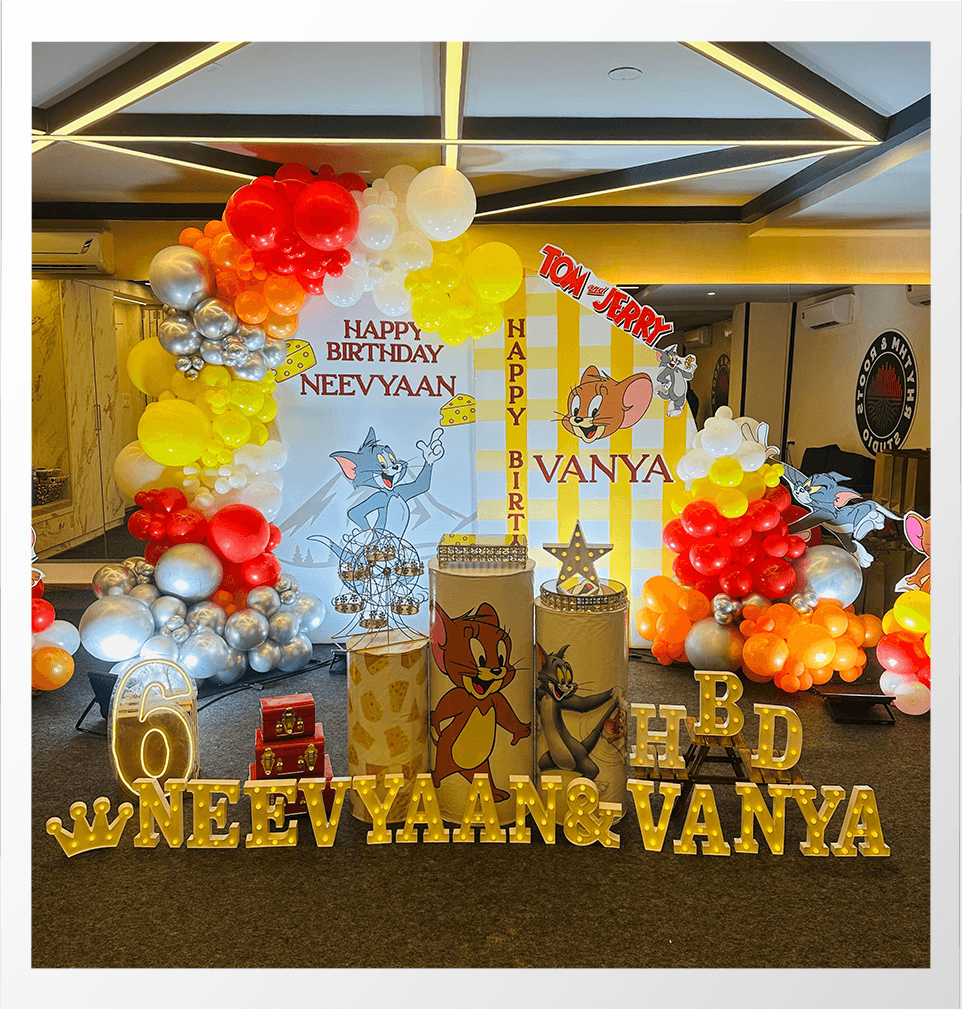 Kids birthday decoration with balloons and cake setup 4